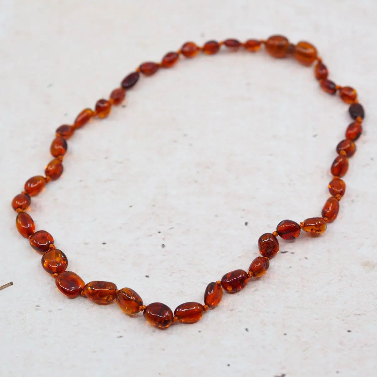Collier d'ambre pour bébé Olive Cognac