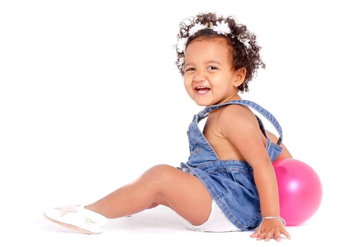 Chaussons en cuir Lookidz Etoile rose fond blanc