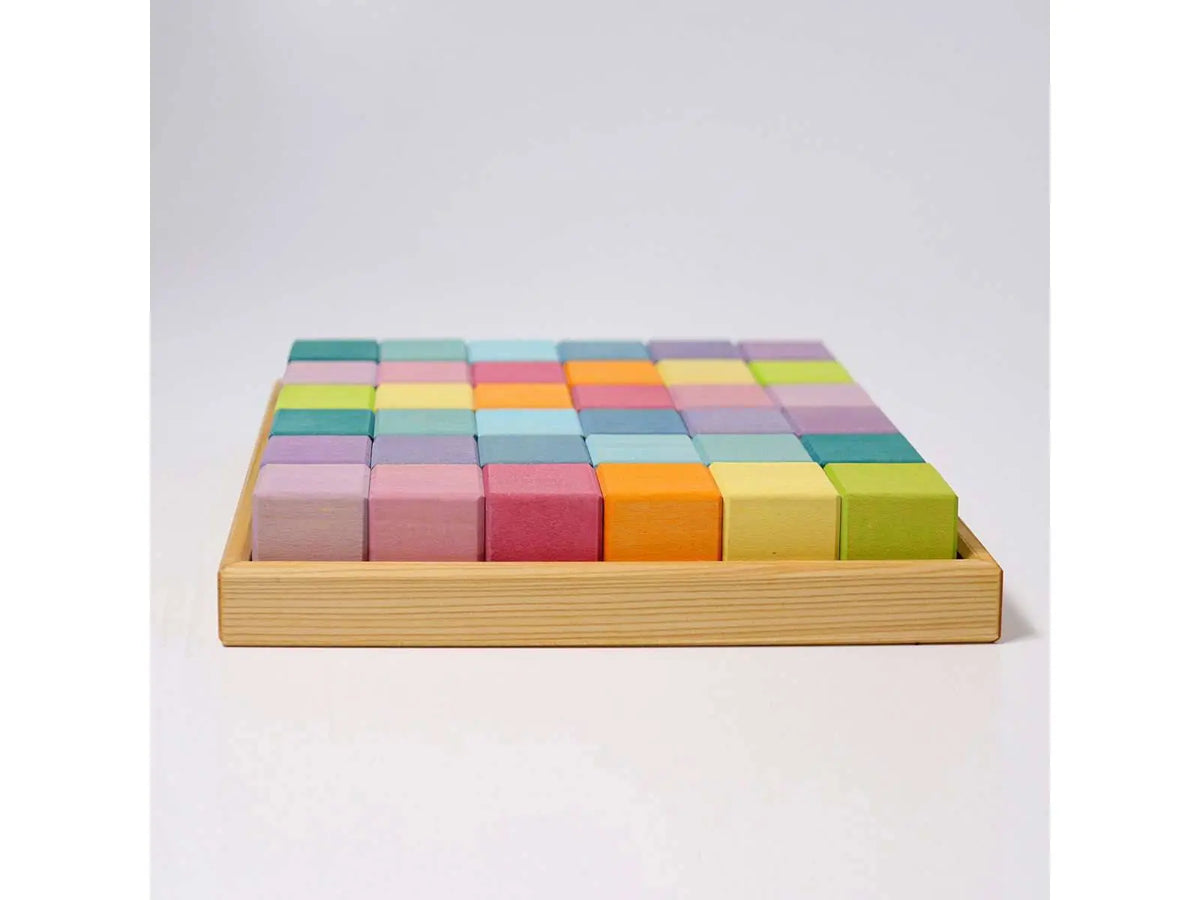 36 cubes en bois - jeu de construction Pastel Grimm's Grimms