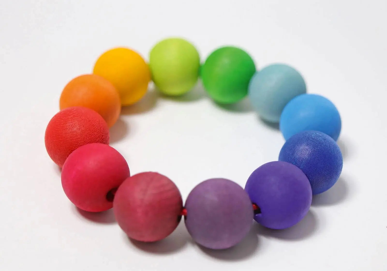 Anneau perles en bois Arc-en-ciel Grimm's Grimms
