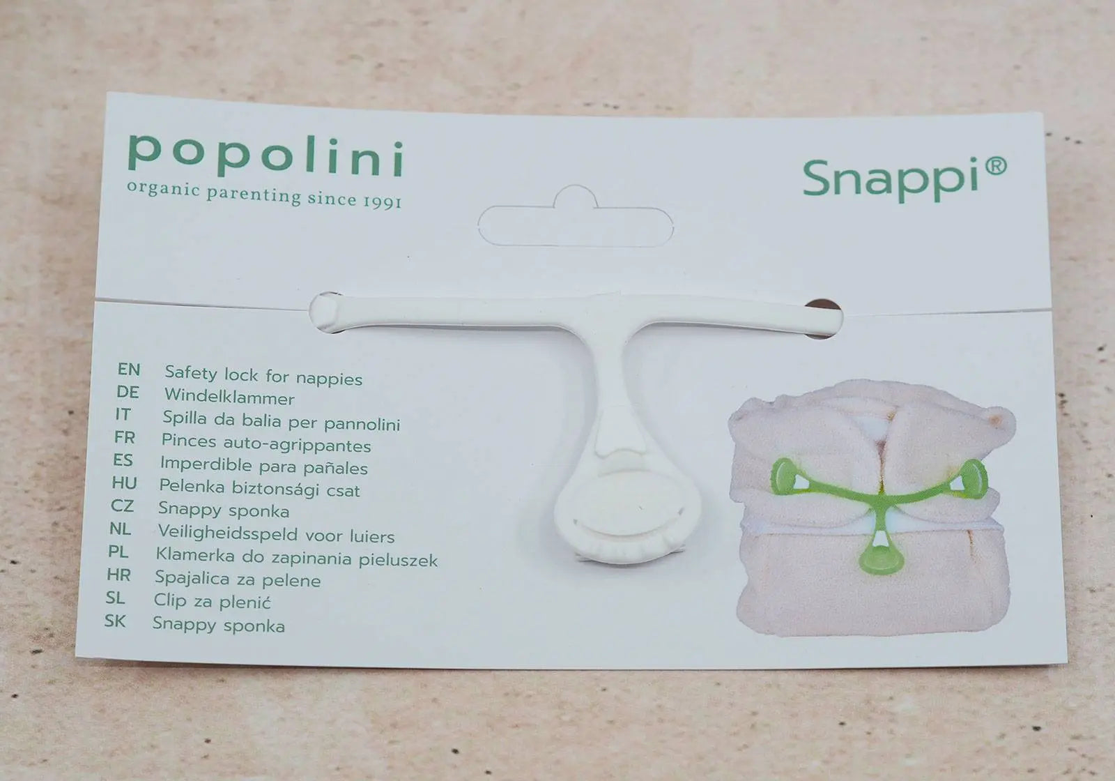 Attache pour les langes snappi Flashy Popolini-blanc