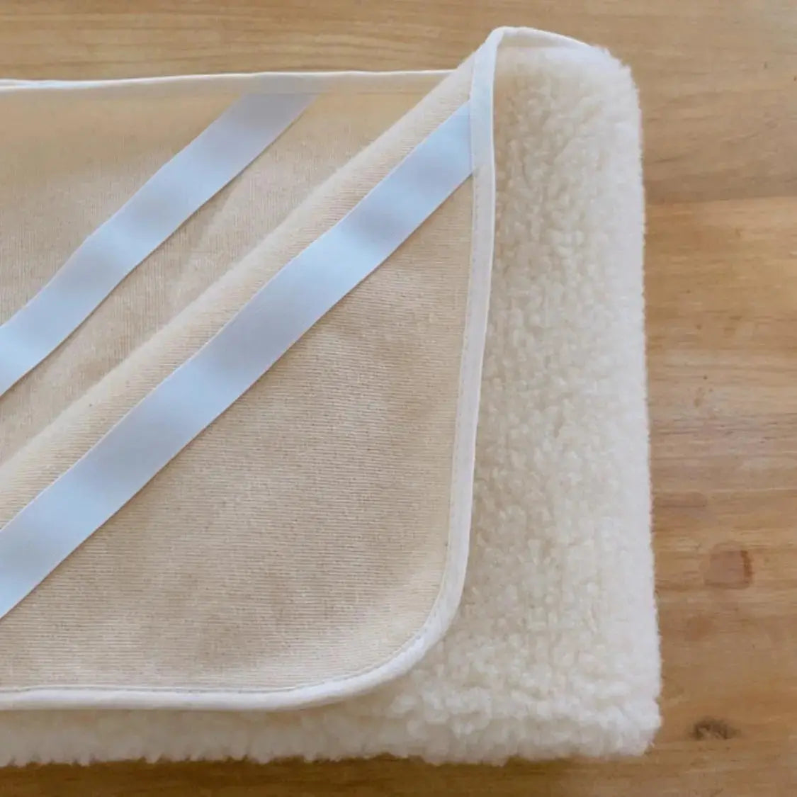 Protège matelas en laine vierge Sassoupi - 70x140cm