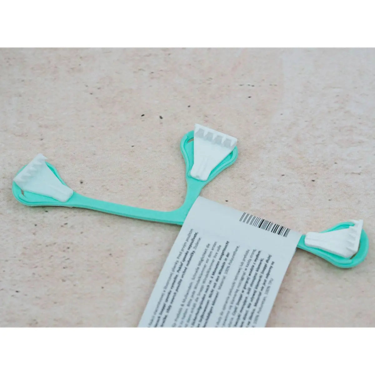 Attache pour les langes Snappi