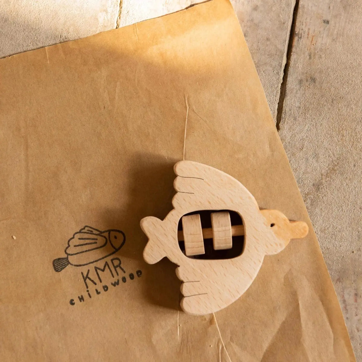 Hochet oiseau en bois brut Musch KMR Childwood
