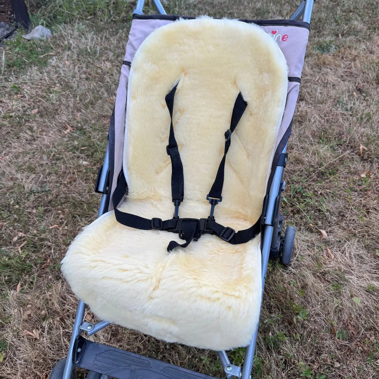 Assise en peau d'agneau Deluxe pour poussette et siège auto Kaiser 