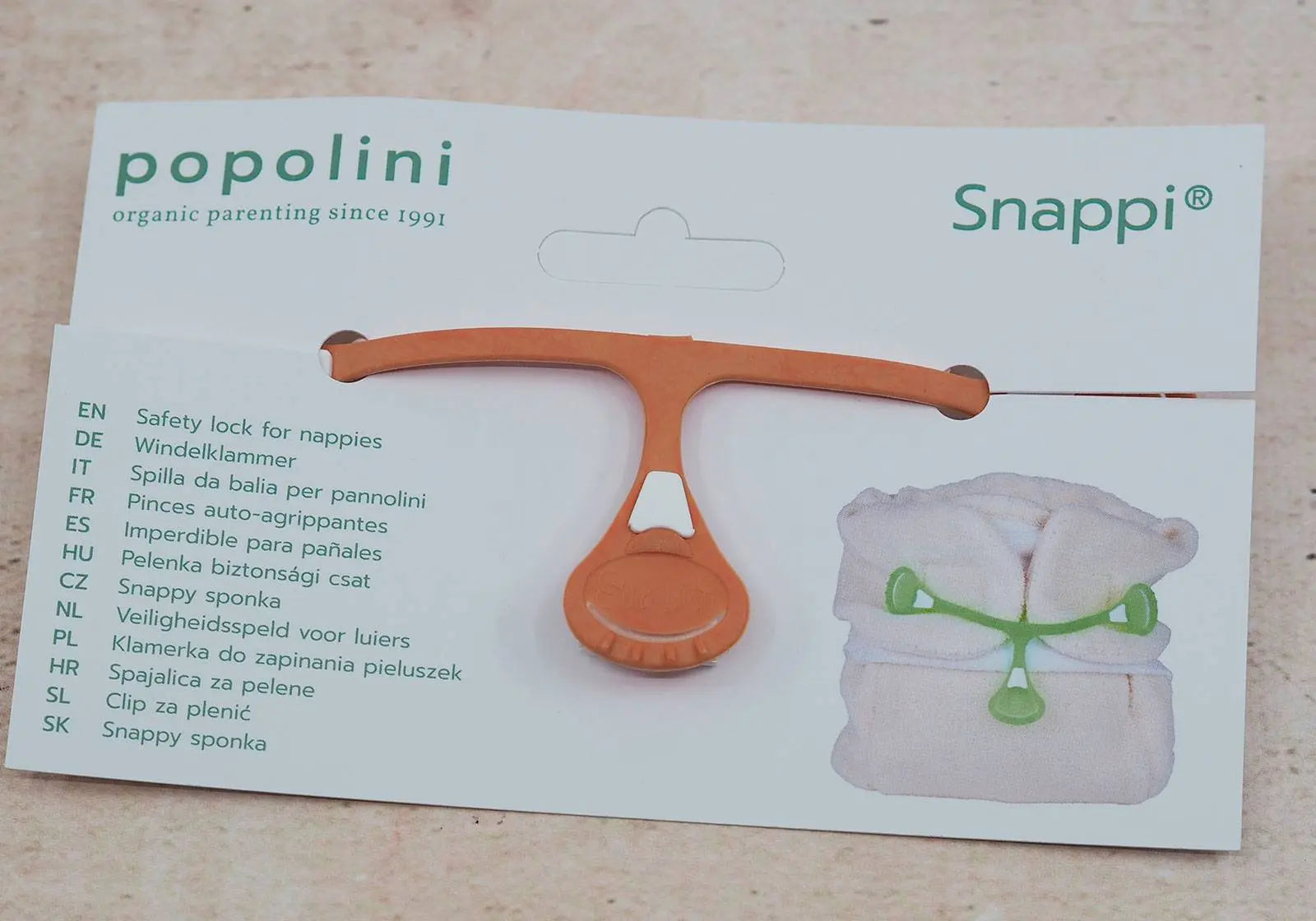 Attache pour les langes snappi Flashy Popolini-Abricot