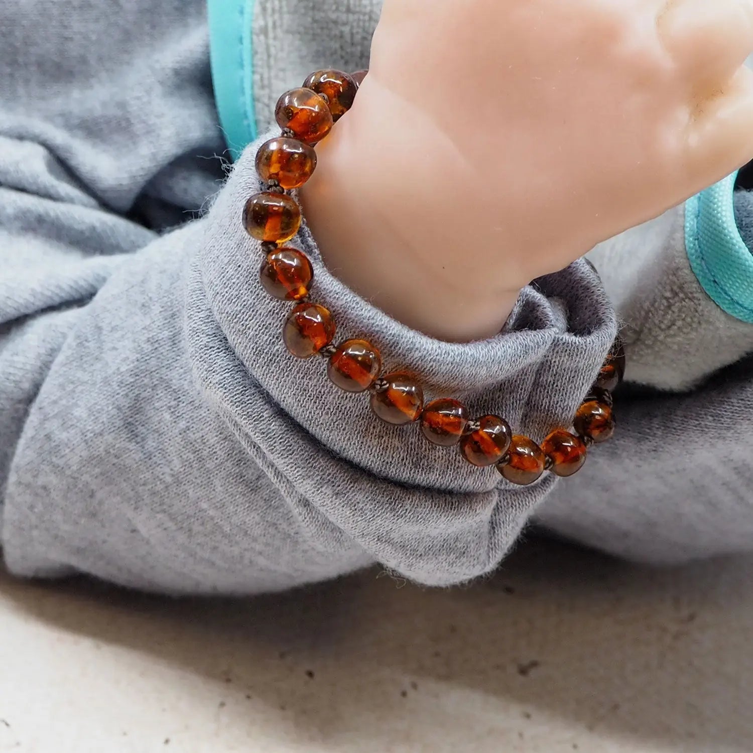 Bracelet d'ambre pour bébé - Cognac 