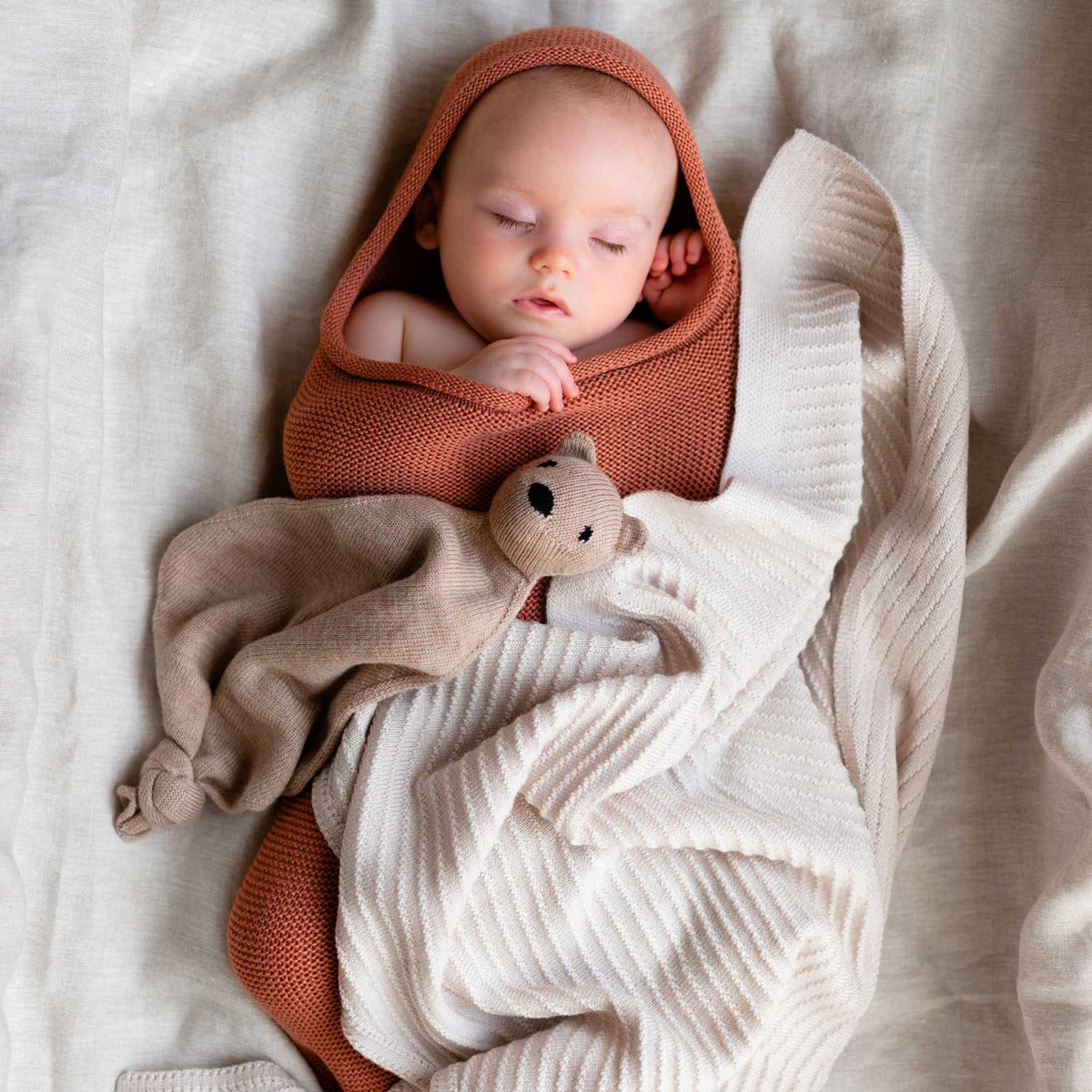 Cocon d'emmaillotage en laine mérinos HVID - Brique - Lilinappy