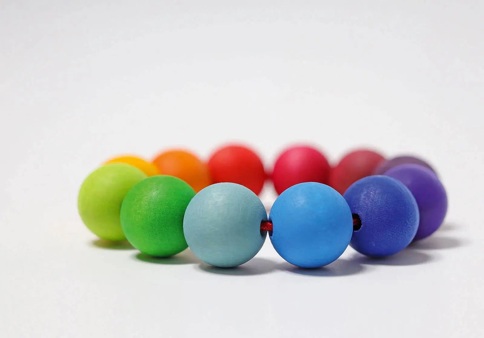 Anneau perles en bois Arc-en-ciel Grimm's 