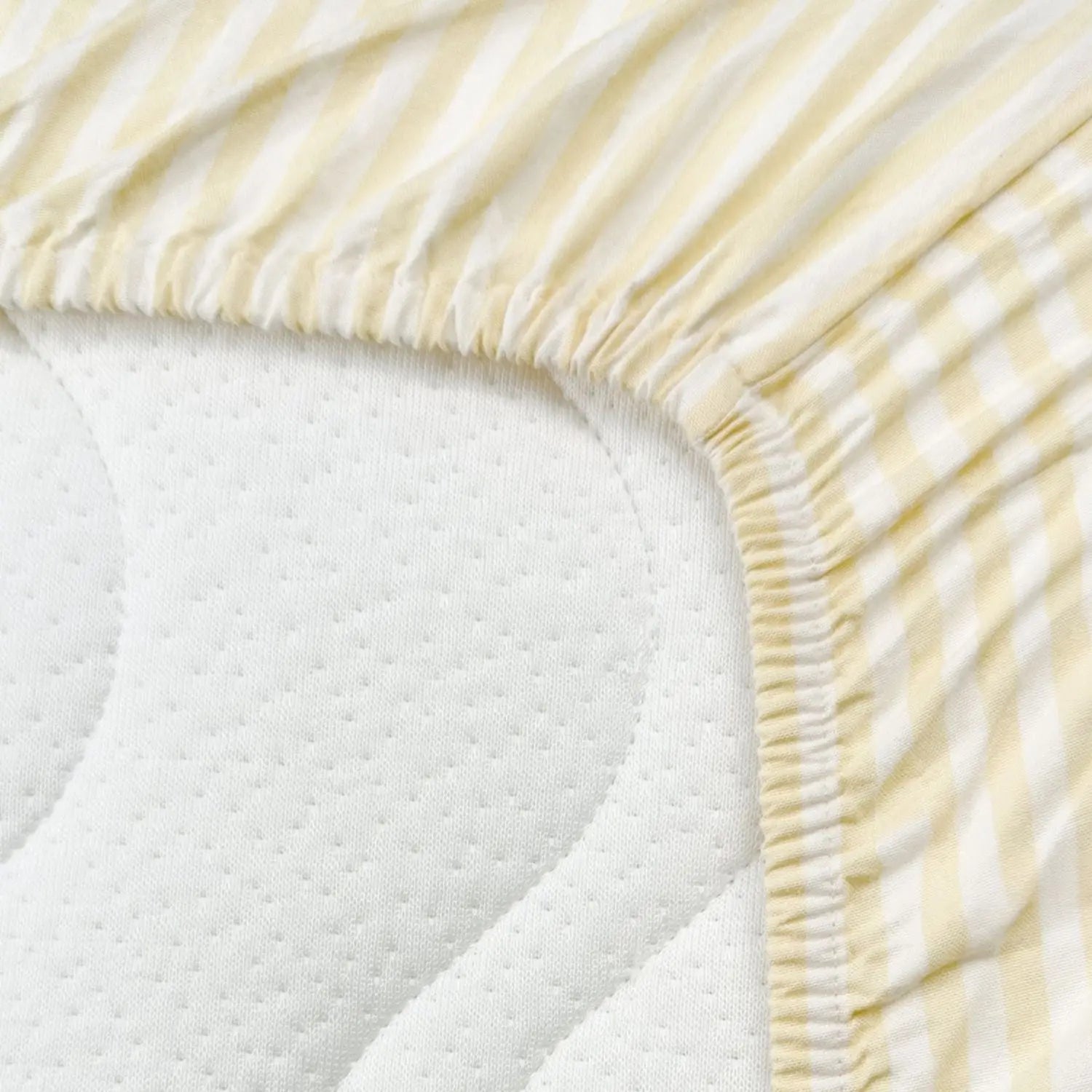 Drap-housse pour lit bébé en coton bio  Kadolis - Rayé jaune 