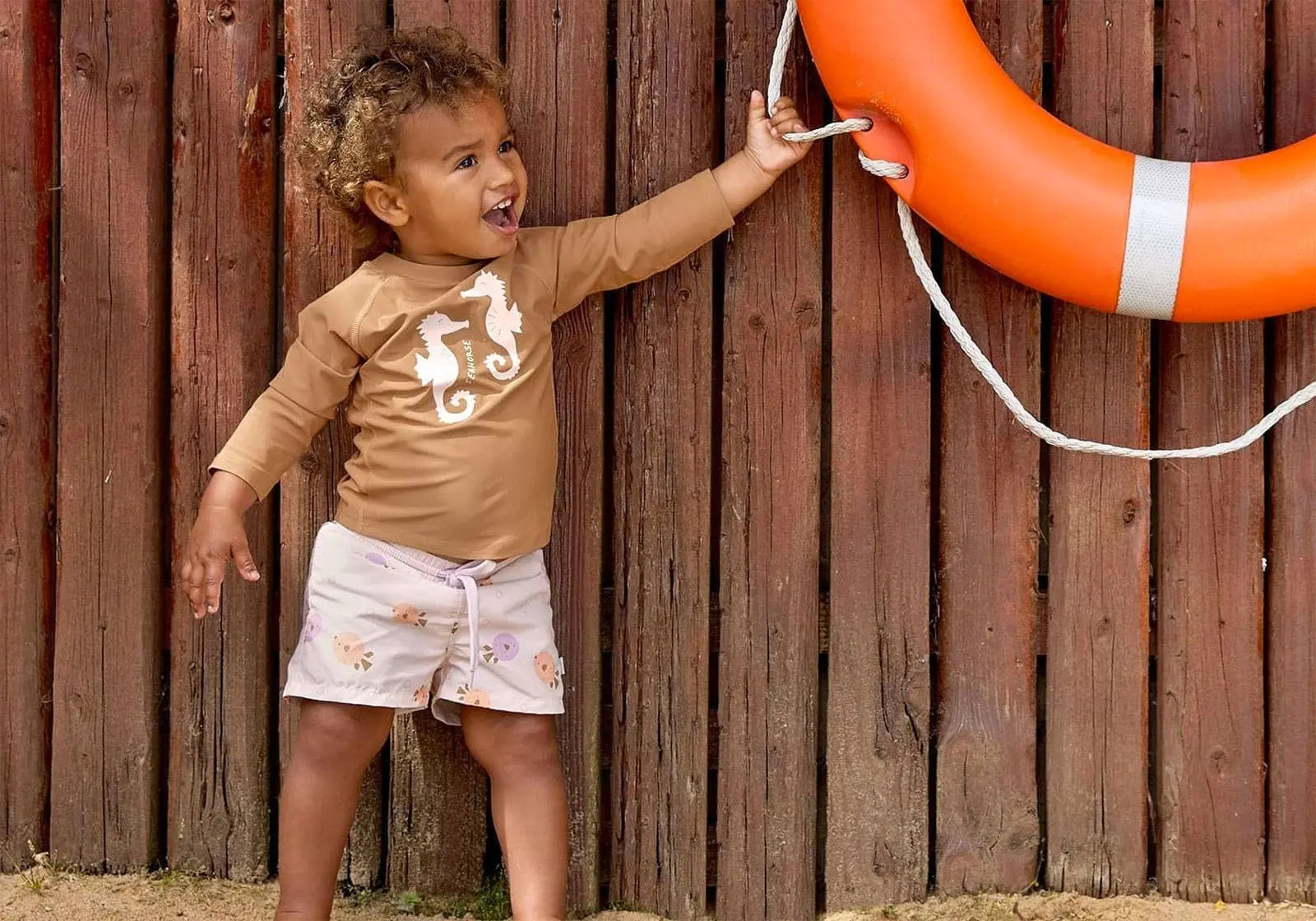 Short de bain bébé Lässig - Poisson rose - Lilinappy