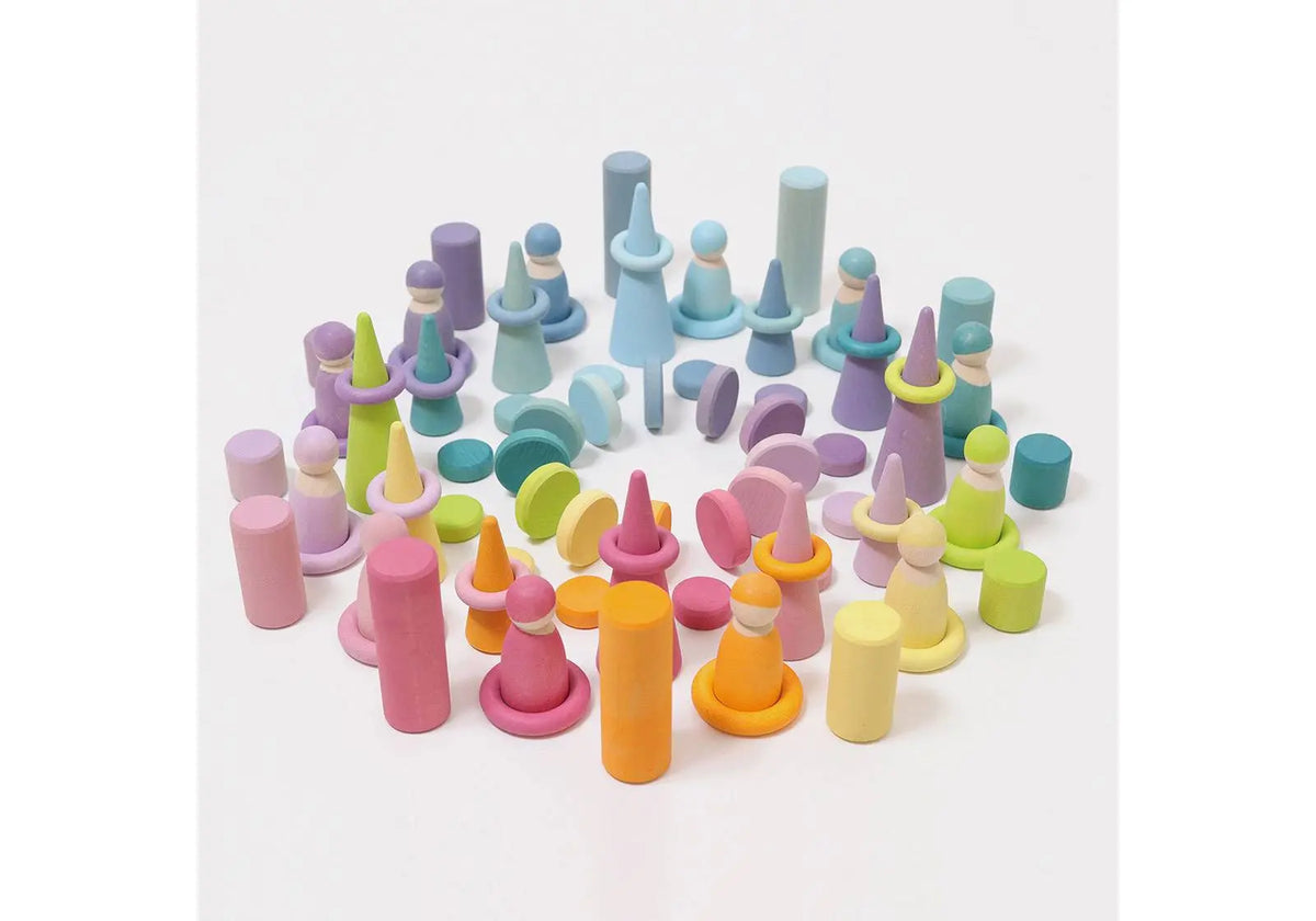 24 pièces en bois coloris pastel Grimm's : jouet libre écologique favorise la motricité fine et développe la créativité