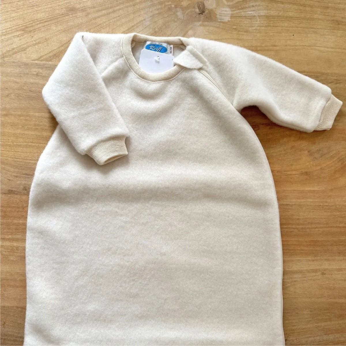 Gigoteuse bébé à manches en polaire de laine mérinos bio Reiff – Naturel