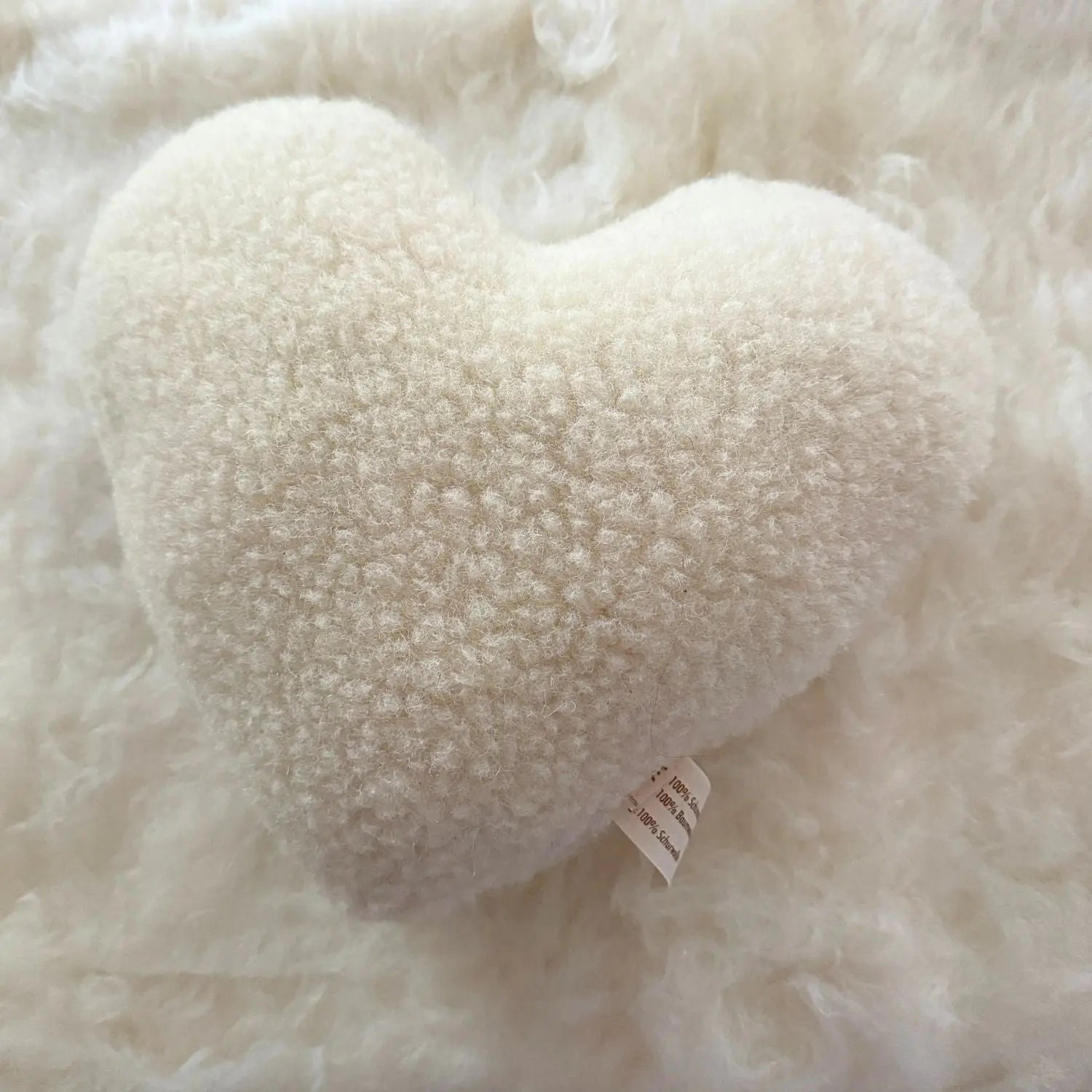 Coussin cœur en laine vierge Sassoupi 