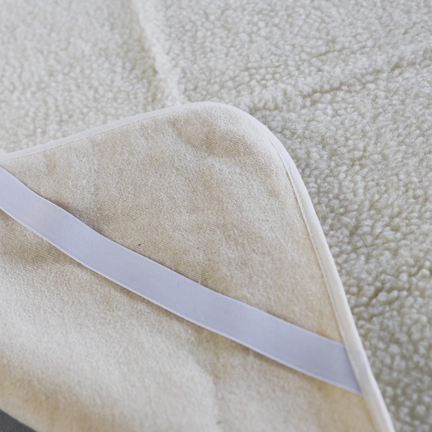 Protège matelas en laine vierge Sassoupi - 90x190 cm 