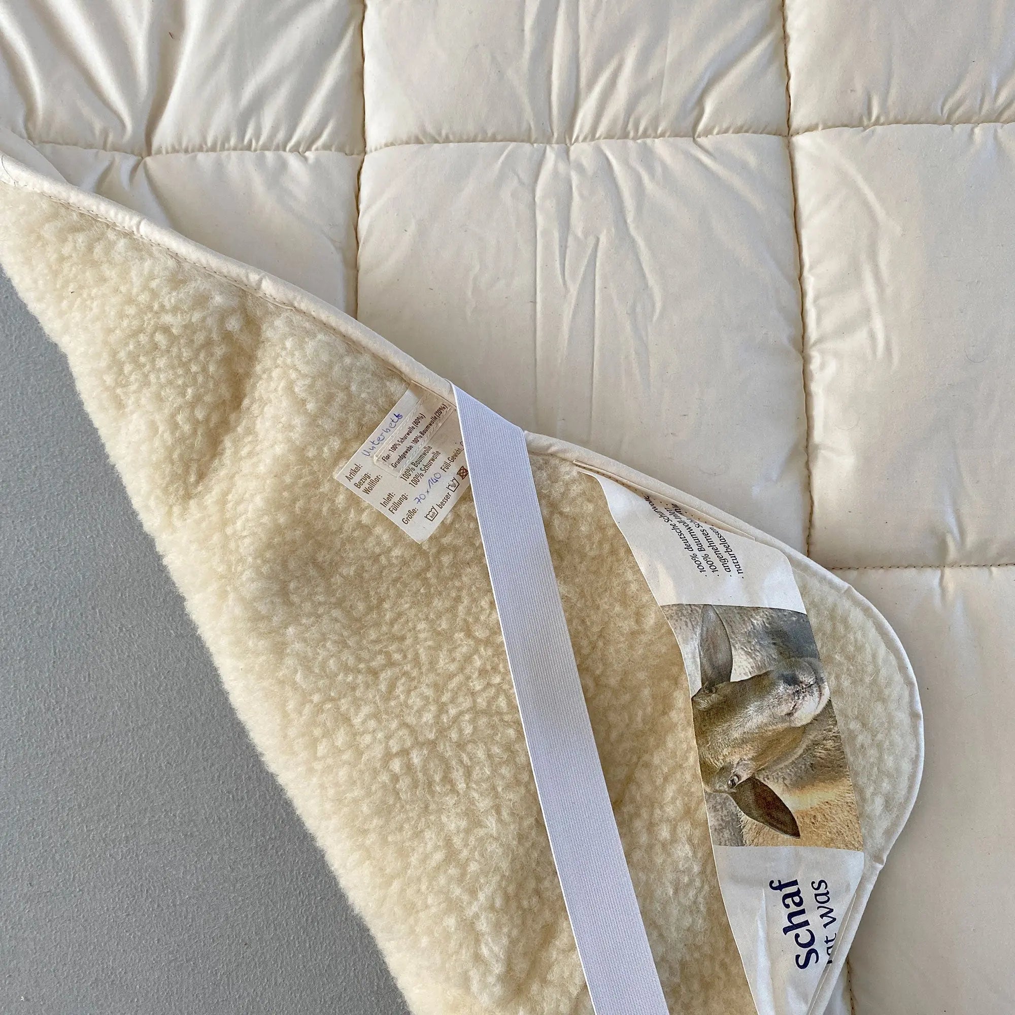 Surmatelas en laine & coton Sassoupi - 70x140cm 