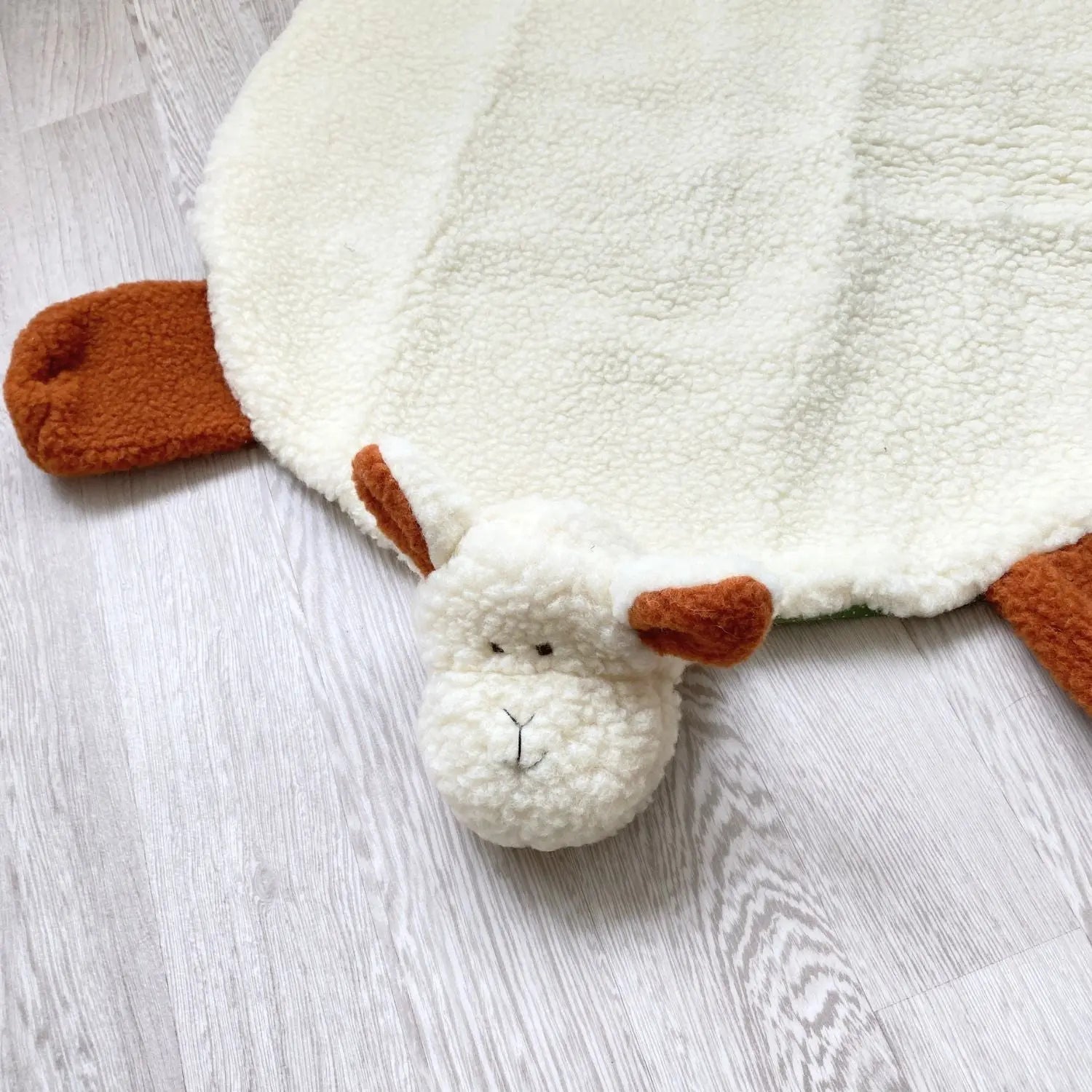 Tapis d'éveil en laine et coton Sassoupi 