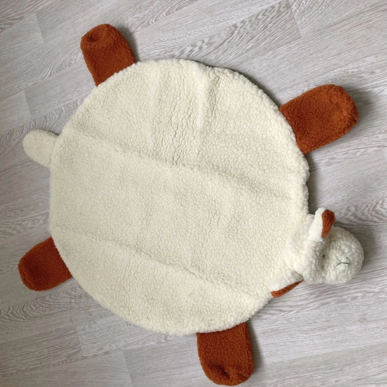 Tapis d'éveil en laine et coton Sassoupi 